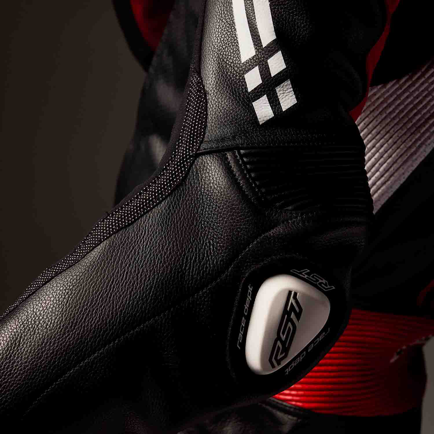 RST Race Dept V4.2 D3O Airbag One Piece Leather Suit Black / Red / White - FREE UK Shipping, FREE 365 Day Returns | Moto Central