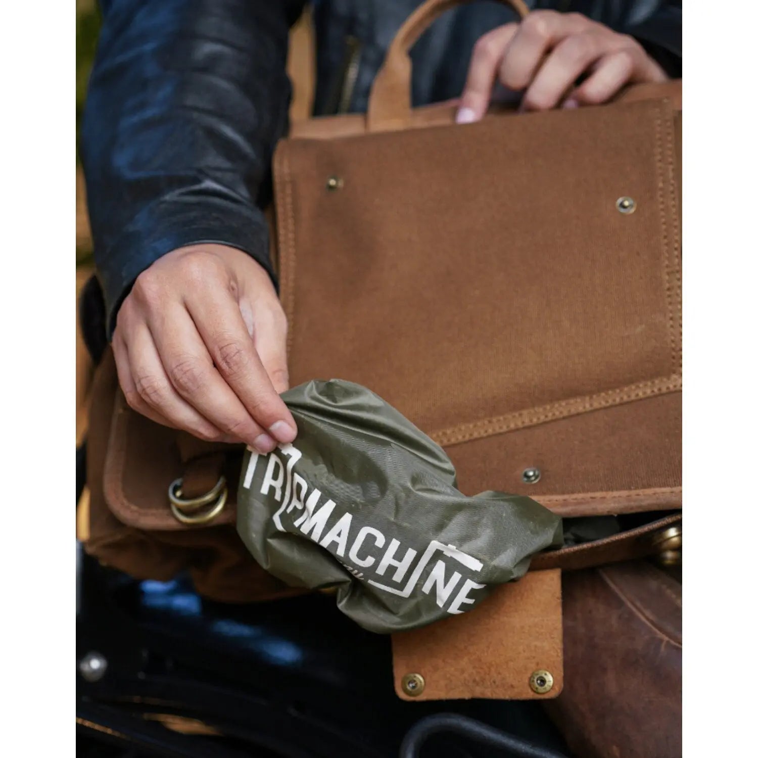 Trip Machine Expedition Saddlebag Brown / Tobacco - Pair internal dry bag being packed