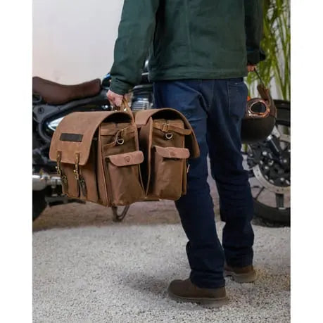 Trip Machine Expedition Saddlebag Brown / Tobacco - Pair pair carried beside a motorcycle