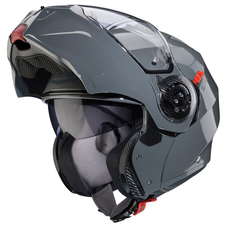 Caberg Duke Evo Stone Grey, left-side view with chin bar raised and sun visor down
