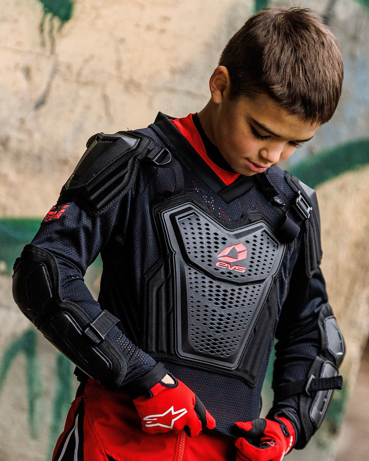 EVS Comp Youth Protection Suit Black, worn front view