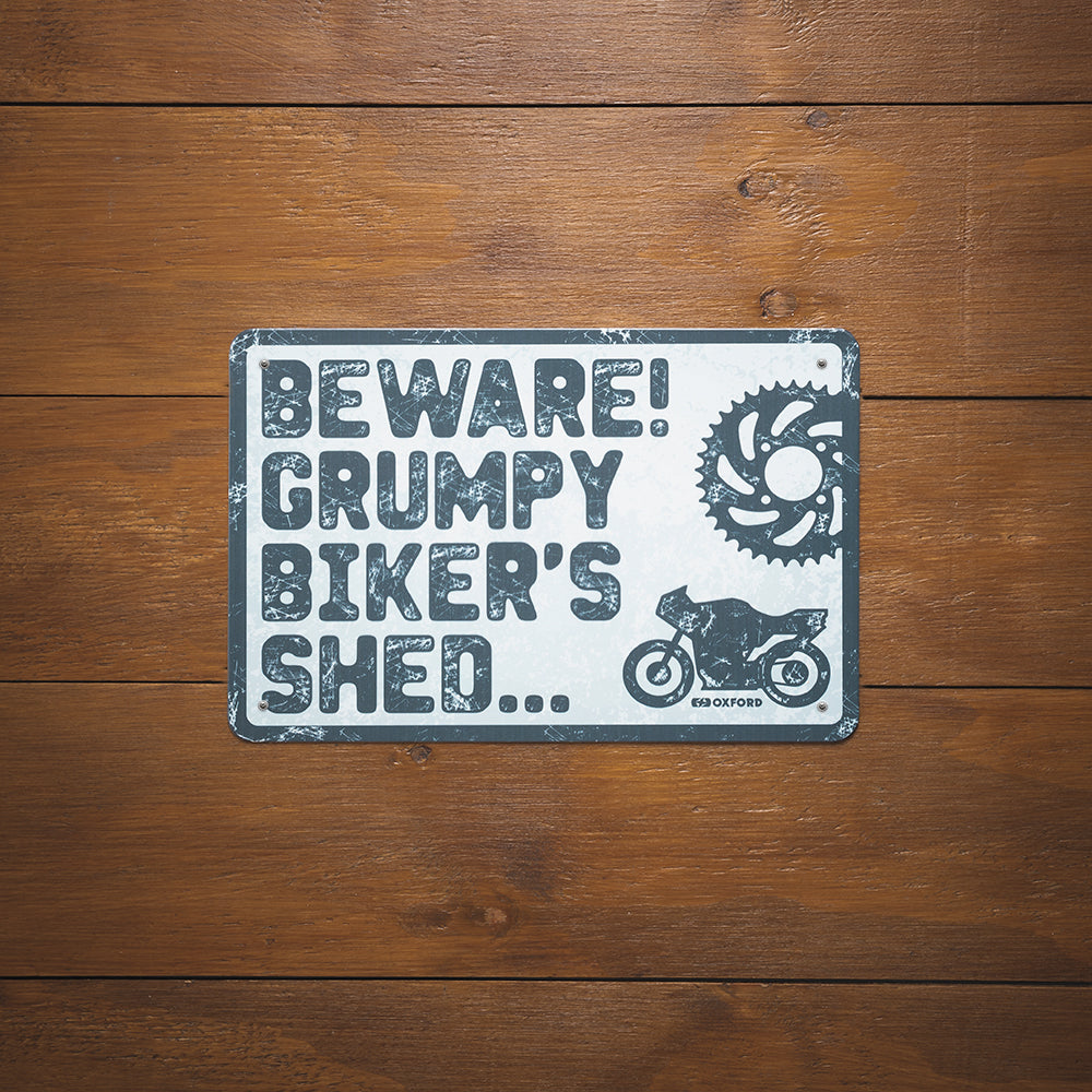 Oxford Beware Garage Metal Sign - 30cm x 20cm x 0.25mm, garage sign mounted on a wooden wall