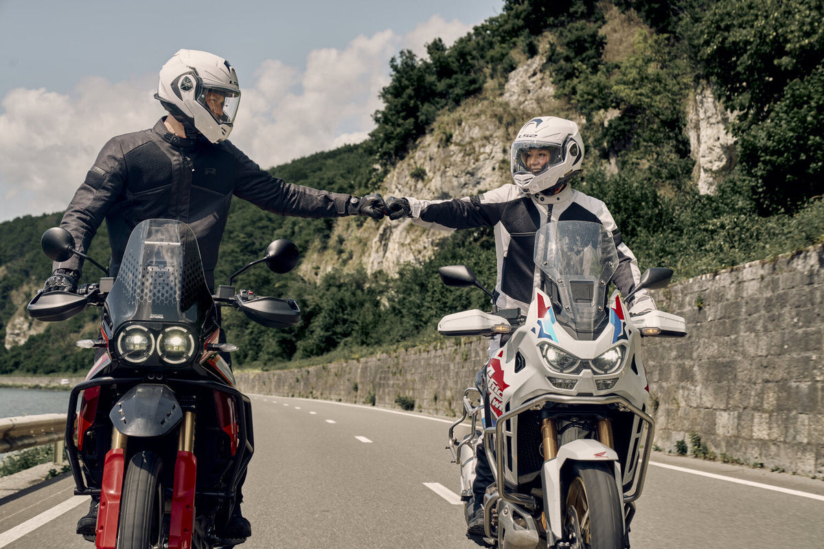 Richa Airstream X-2 Ladies Textile Jacket Black, worn by a rider beside another motorcyclist