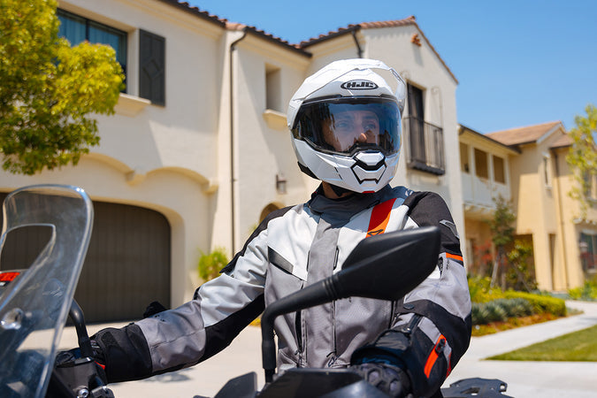 HJC i80 modular adventure helmet worn by a rider