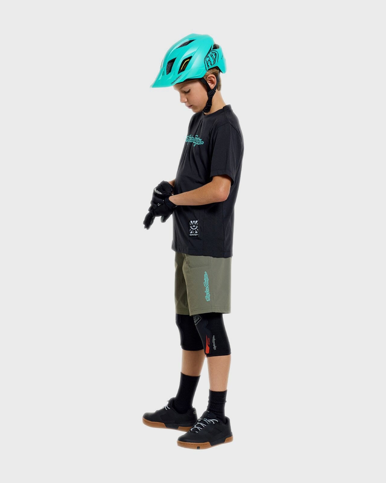Troy Lee Designs Skyline Ride Short Sleeves Youth Cycle T-Shirt Signature Black / Real Teal - FREE UK Shipping, FREE 365 Day Returns | Moto Central